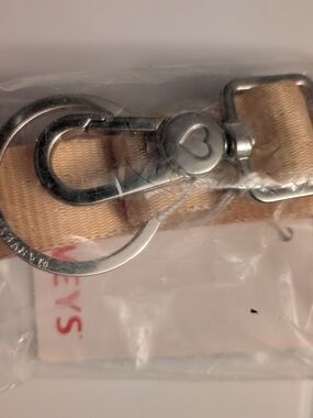 Harveys Sunshine Click And Go Keychain with silver heart hardware